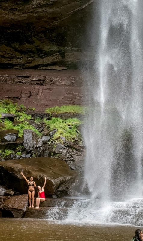 Two women at the bottom of Kaaterskill Falls
