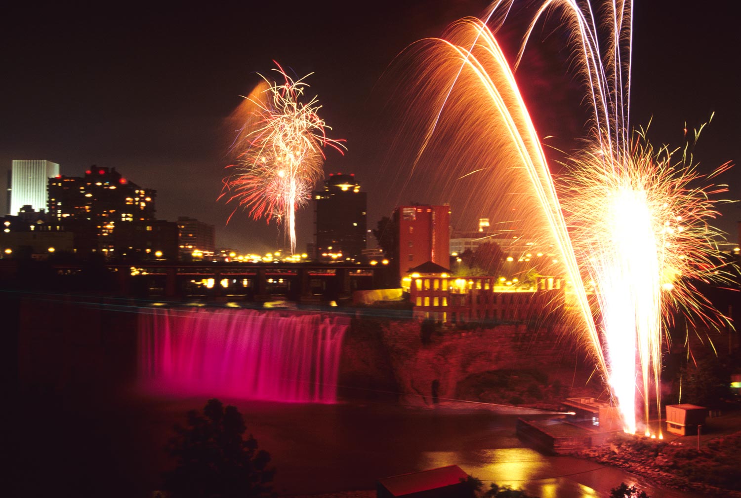 High Falls with fireworks at night in Rochester, NY